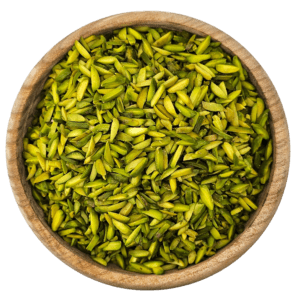 Close-up of slivered pistachios in a wooden bowl